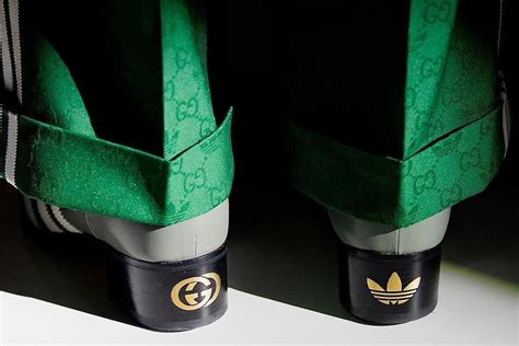 gucci adidas collab release date|adidas gucci collab suit.